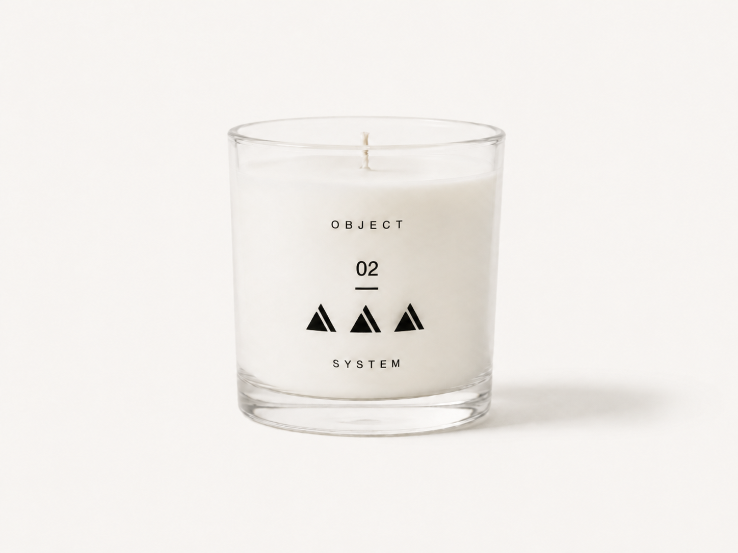OBJECT 02 floral scented candle in clear glass vessel