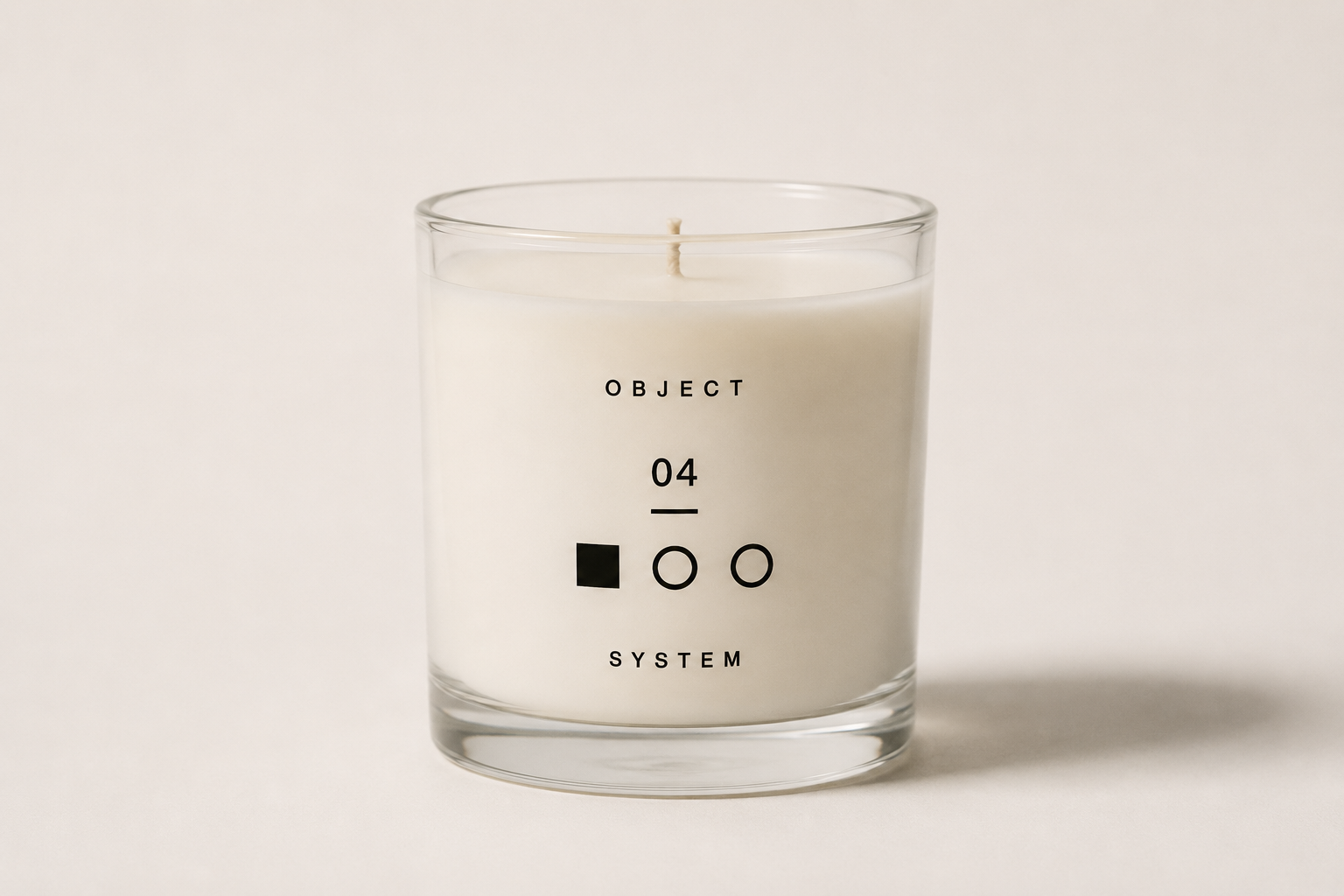 OBJECT 04 wood and air scented candle in clear glass vessel