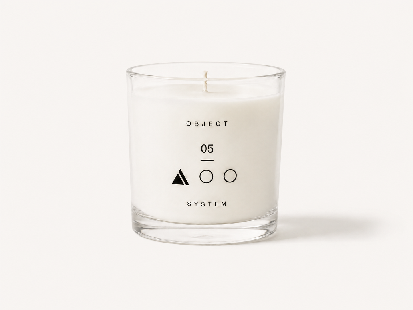 OBJECT 05 floral and air scented candle in clear glass vessel