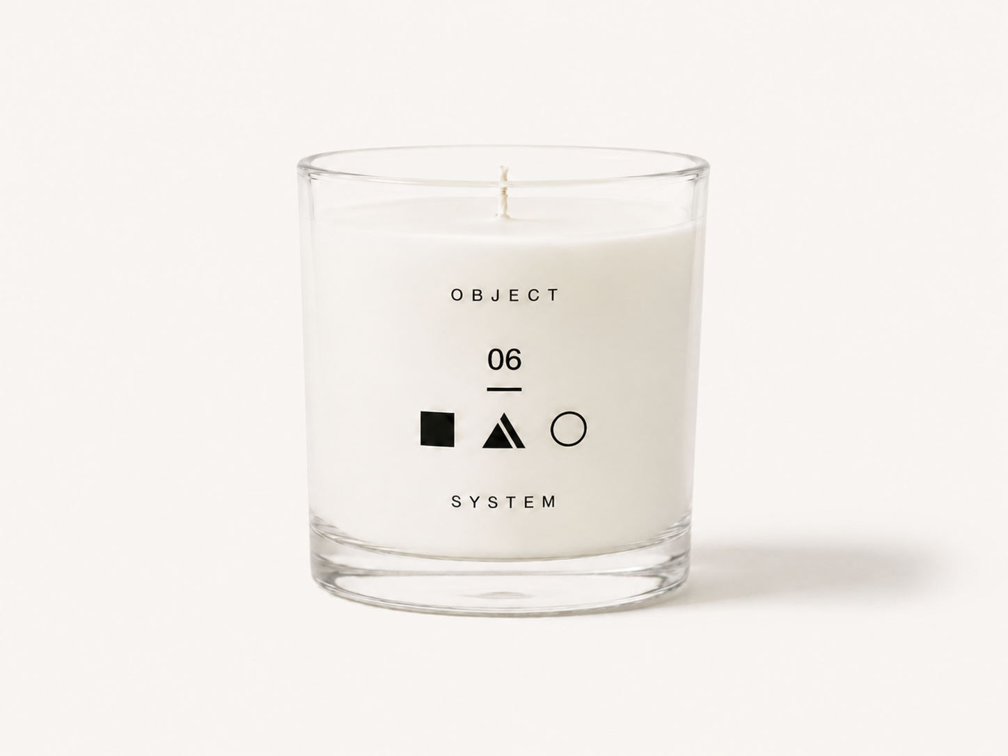 OBJECT 06 wood floral and air scented candle in clear glass vessel