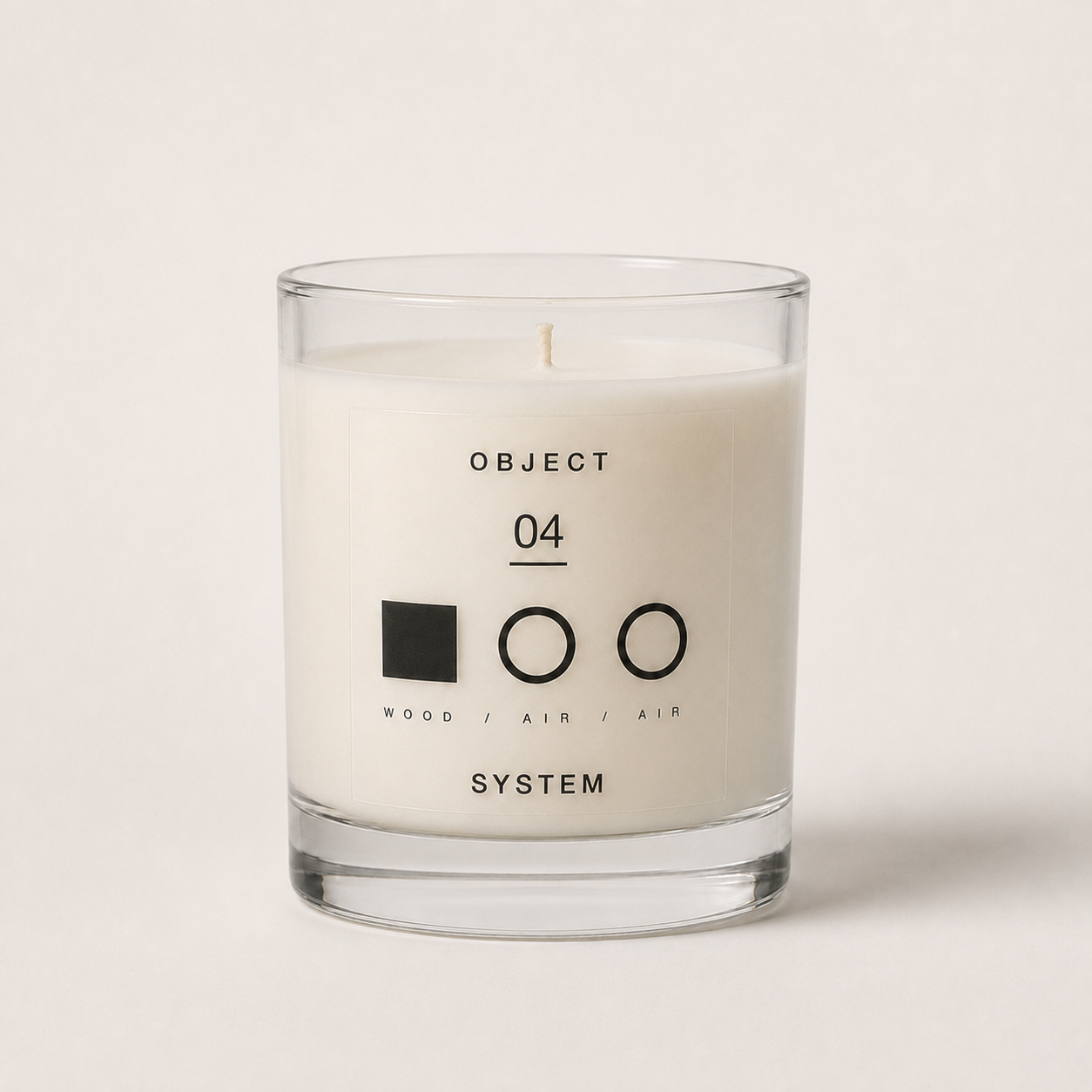 OBJECT 04 wood and air scented candle in clear glass vessel
