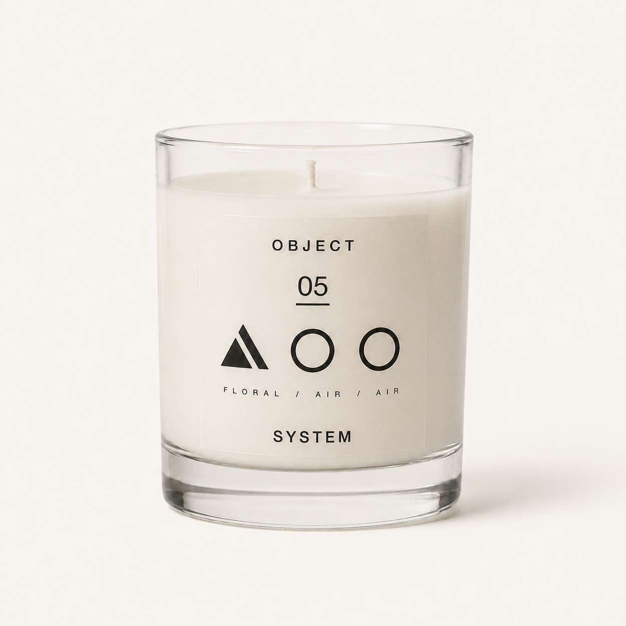 OBJECT 05 floral and air scented candle in clear glass vessel